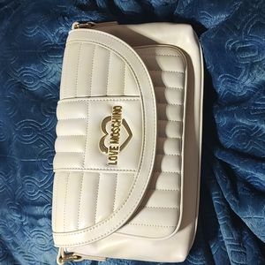 Purse this is a designer purse love machino leather I've never carried it